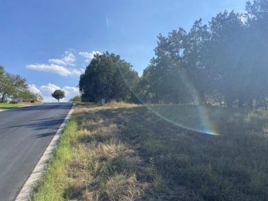 Don't miss out on this pretty wooded lot in Horseshoe Bay West on Apple Rock Golf Course - Horseshoe Bay in Texas - for sale on GolfHomes.com, golf home, golf lot
