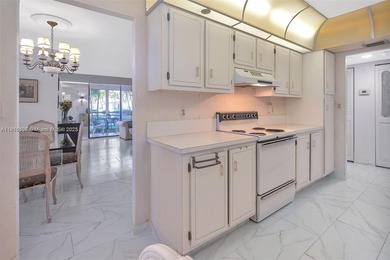 Spacious Corner Unit in sought after 55+ Community.Welcome to on Pembroke Lakes Golf Club in Florida - for sale on GolfHomes.com, golf home, golf lot