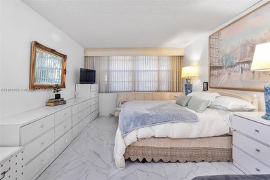 Spacious Corner Unit in sought after 55+ Community.Welcome to on Pembroke Lakes Golf Club in Florida - for sale on GolfHomes.com, golf home, golf lot