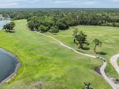 Welcome to your dream home in the highly sought-after on Bloomingdale Golfers Club in Florida - for sale on GolfHomes.com, golf home, golf lot