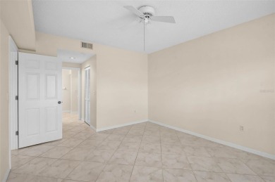 Ground Floor End-Unit Condo in Fairway Trace at Peridia Golf & on Peridia Golf and Country Club in Florida - for sale on GolfHomes.com, golf home, golf lot