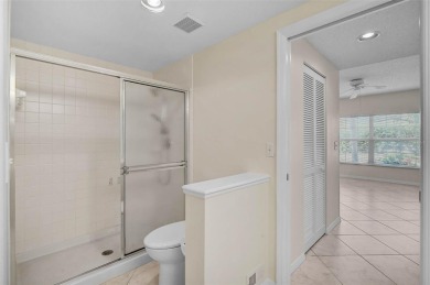 Ground Floor End-Unit Condo in Fairway Trace at Peridia Golf & on Peridia Golf and Country Club in Florida - for sale on GolfHomes.com, golf home, golf lot