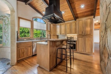 Truly one-of-a-kind Tudor-style home with timeless character & on Avondale Golf and Tennis Club in Idaho - for sale on GolfHomes.com, golf home, golf lot