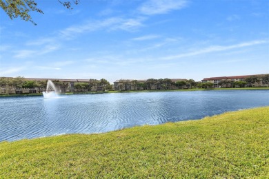 Enjoy the resort-style life you deserve in this 2-bedroom on Flamingo Lakes Country Club in Florida - for sale on GolfHomes.com, golf home, golf lot