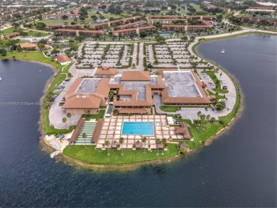 Enjoy the resort-style life you deserve in this 2-bedroom on Flamingo Lakes Country Club in Florida - for sale on GolfHomes.com, golf home, golf lot
