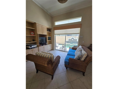 Enter through a private entrance to a peacefully courtyard with on Kensington Golf and Country Club in Florida - for sale on GolfHomes.com, golf home, golf lot