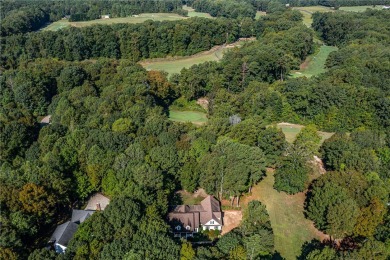 This lovely home sits in the desirable community of The Landing on Piankatank River Golf Club in Virginia - for sale on GolfHomes.com, golf home, golf lot
