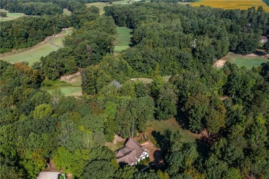 This lovely home sits in the desirable community of The Landing on Piankatank River Golf Club in Virginia - for sale on GolfHomes.com, golf home, golf lot