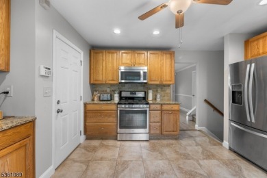 Beautifully maintained 3BR split-level backing to a golf course! on High Bridge Hills Golf Club in New Jersey - for sale on GolfHomes.com, golf home, golf lot