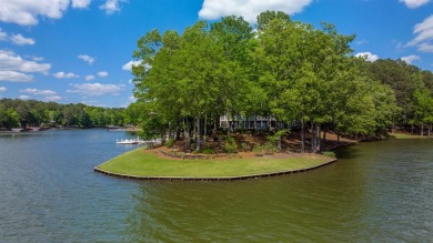 The ultimate in lakefront living with over 500 feet of shoreline on Reynolds Lake Oconee - The Landing in Georgia - for sale on GolfHomes.com, golf home, golf lot