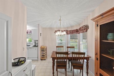 Nestled against a tranquil wooded backdrop, this beautifully on El Diablo Executive Golf Course in Florida - for sale on GolfHomes.com, golf home, golf lot