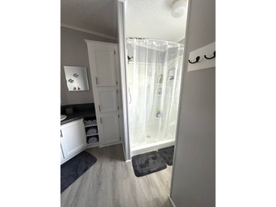 Escape to serenity in this charming 2-bedroom home, boasting on Schalamar Creek Golf and Country Club in Florida - for sale on GolfHomes.com, golf home, golf lot