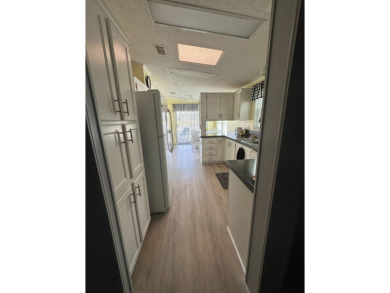 Escape to serenity in this charming 2-bedroom home, boasting on Schalamar Creek Golf and Country Club in Florida - for sale on GolfHomes.com, golf home, golf lot