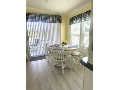 Escape to serenity in this charming 2-bedroom home, boasting on Schalamar Creek Golf and Country Club in Florida - for sale on GolfHomes.com, golf home, golf lot