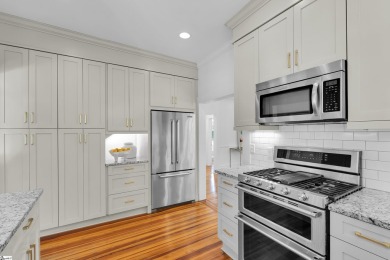This fully renovated 4 bedroom, 2  1/2  bathroom bungalow blends on Greenville Country Club in South Carolina - for sale on GolfHomes.com, golf home, golf lot
