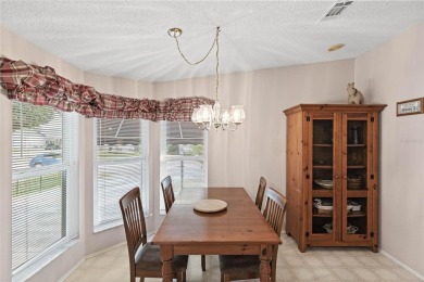 Nestled against a tranquil wooded backdrop, this beautifully on El Diablo Executive Golf Course in Florida - for sale on GolfHomes.com, golf home, golf lot