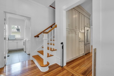 This fully renovated 4 bedroom, 2  1/2  bathroom bungalow blends on Greenville Country Club in South Carolina - for sale on GolfHomes.com, golf home, golf lot