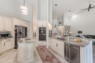 Experience refined Florida living in this stunning 3-bedroom, 3 on Bayou Golf Club in Florida - for sale on GolfHomes.com, golf home, golf lot