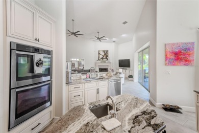 Experience refined Florida living in this stunning 3-bedroom, 3 on Bayou Golf Club in Florida - for sale on GolfHomes.com, golf home, golf lot
