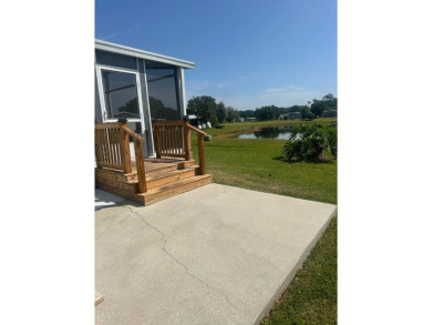 Escape to serenity in this charming 2-bedroom home, boasting on Schalamar Creek Golf and Country Club in Florida - for sale on GolfHomes.com, golf home, golf lot