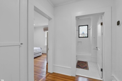 This fully renovated 4 bedroom, 2  1/2  bathroom bungalow blends on Greenville Country Club in South Carolina - for sale on GolfHomes.com, golf home, golf lot
