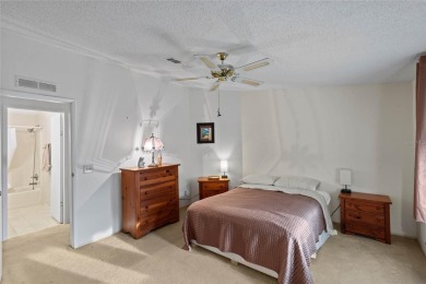 Nestled against a tranquil wooded backdrop, this beautifully on El Diablo Executive Golf Course in Florida - for sale on GolfHomes.com, golf home, golf lot
