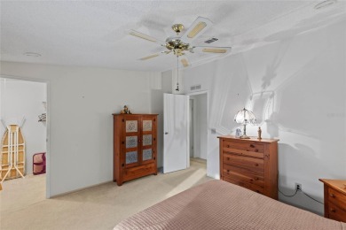 Nestled against a tranquil wooded backdrop, this beautifully on El Diablo Executive Golf Course in Florida - for sale on GolfHomes.com, golf home, golf lot