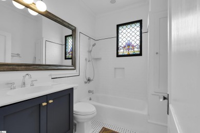 This fully renovated 4 bedroom, 2  1/2  bathroom bungalow blends on Greenville Country Club in South Carolina - for sale on GolfHomes.com, golf home, golf lot