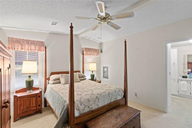 Nestled against a tranquil wooded backdrop, this beautifully on El Diablo Executive Golf Course in Florida - for sale on GolfHomes.com, golf home, golf lot
