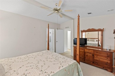 Nestled against a tranquil wooded backdrop, this beautifully on El Diablo Executive Golf Course in Florida - for sale on GolfHomes.com, golf home, golf lot