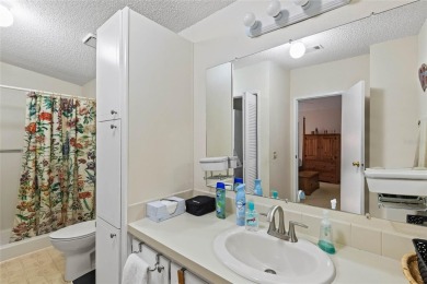 Nestled against a tranquil wooded backdrop, this beautifully on El Diablo Executive Golf Course in Florida - for sale on GolfHomes.com, golf home, golf lot