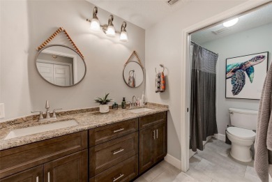 Experience refined Florida living in this stunning 3-bedroom, 3 on Bayou Golf Club in Florida - for sale on GolfHomes.com, golf home, golf lot