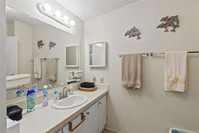 Nestled against a tranquil wooded backdrop, this beautifully on El Diablo Executive Golf Course in Florida - for sale on GolfHomes.com, golf home, golf lot
