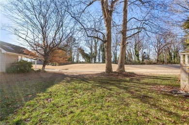 This is a beautiful end unit condo that backs up to the on Greenbrier Country Club in Virginia - for sale on GolfHomes.com, golf home, golf lot