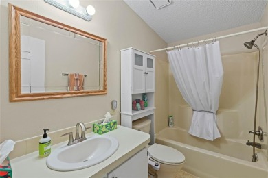 Nestled against a tranquil wooded backdrop, this beautifully on El Diablo Executive Golf Course in Florida - for sale on GolfHomes.com, golf home, golf lot