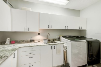 Experience refined Florida living in this stunning 3-bedroom, 3 on Bayou Golf Club in Florida - for sale on GolfHomes.com, golf home, golf lot