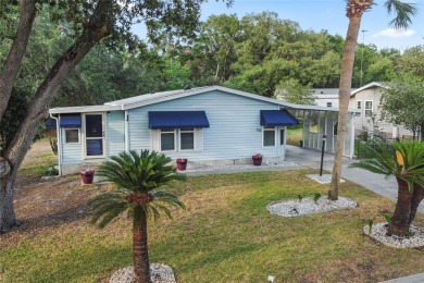 Nestled against a tranquil wooded backdrop, this beautifully on El Diablo Executive Golf Course in Florida - for sale on GolfHomes.com, golf home, golf lot