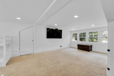 This fully renovated 4 bedroom, 2  1/2  bathroom bungalow blends on Greenville Country Club in South Carolina - for sale on GolfHomes.com, golf home, golf lot