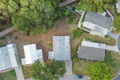 Nestled against a tranquil wooded backdrop, this beautifully on El Diablo Executive Golf Course in Florida - for sale on GolfHomes.com, golf home, golf lot