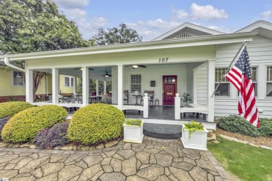 This fully renovated 4 bedroom, 2  1/2  bathroom bungalow blends on Greenville Country Club in South Carolina - for sale on GolfHomes.com, golf home, golf lot