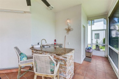 Experience refined Florida living in this stunning 3-bedroom, 3 on Bayou Golf Club in Florida - for sale on GolfHomes.com, golf home, golf lot