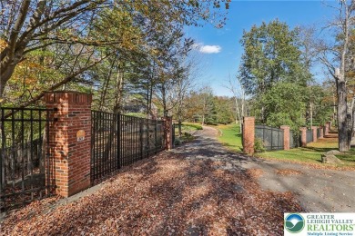 Experience refined luxury and serene privacy in this exceptional on Caesars Pocono Palace Resort in Pennsylvania - for sale on GolfHomes.com, golf home, golf lot