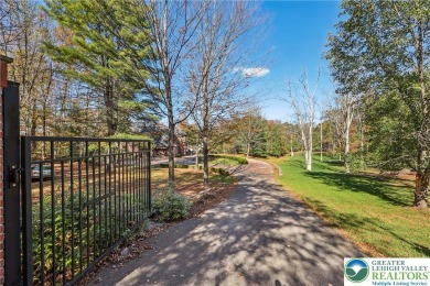 Experience refined luxury and serene privacy in this exceptional on Caesars Pocono Palace Resort in Pennsylvania - for sale on GolfHomes.com, golf home, golf lot
