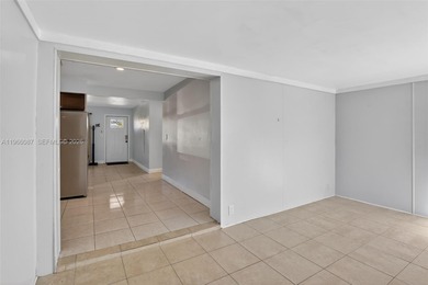 Located in the heart of Cooper City on a beautiful tree-lined on Cooper Colony Country Club in Florida - for sale on GolfHomes.com, golf home, golf lot