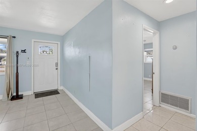 Located in the heart of Cooper City on a beautiful tree-lined on Cooper Colony Country Club in Florida - for sale on GolfHomes.com, golf home, golf lot