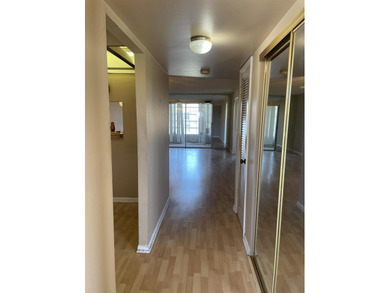 This 2 bed/2 bath top floor home has tons of potential!  With on Sunrise Lakes Phase III in Florida - for sale on GolfHomes.com, golf home, golf lot