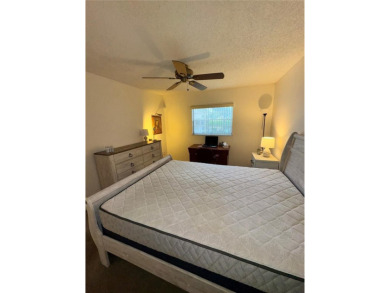 Make this BEAUTIFULLY FURNISHED well-kept 2-bedroom 2-bath in on Summertree Golf Course in Florida - for sale on GolfHomes.com, golf home, golf lot