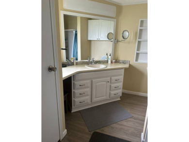 Your Turn-Key Cozy Retreat Awaits!    Step into this charming on Schalamar Creek Golf and Country Club in Florida - for sale on GolfHomes.com, golf home, golf lot