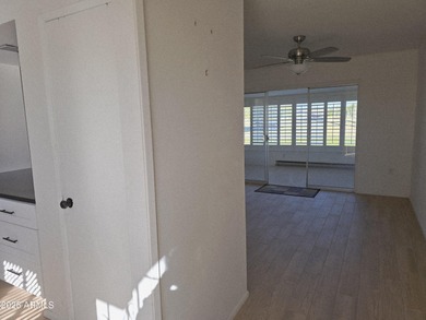 Panoramic golf course views in this desirable end-unit, 4-plex on Sun City South Golf Course in Arizona - for sale on GolfHomes.com, golf home, golf lot