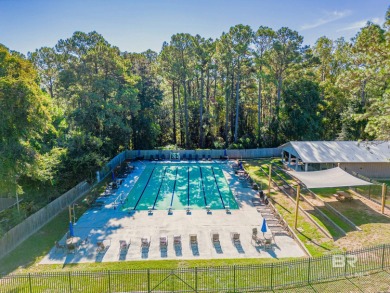 There's a rhythm to life in Lake Forest that locals know by on Lake Forest Yacht and Country Club in Alabama - for sale on GolfHomes.com, golf home, golf lot